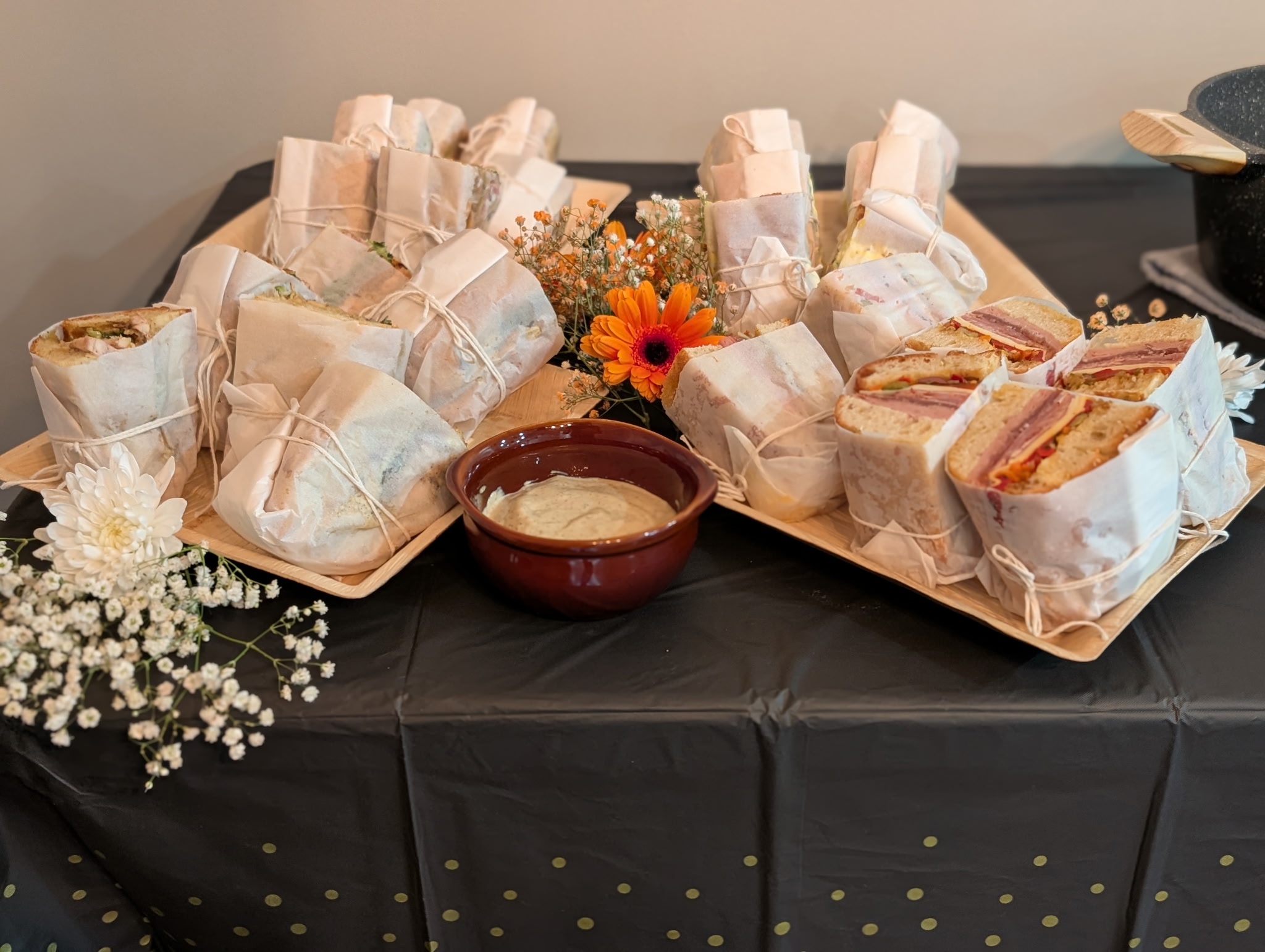 Gourmet sandwich service with floral presentation